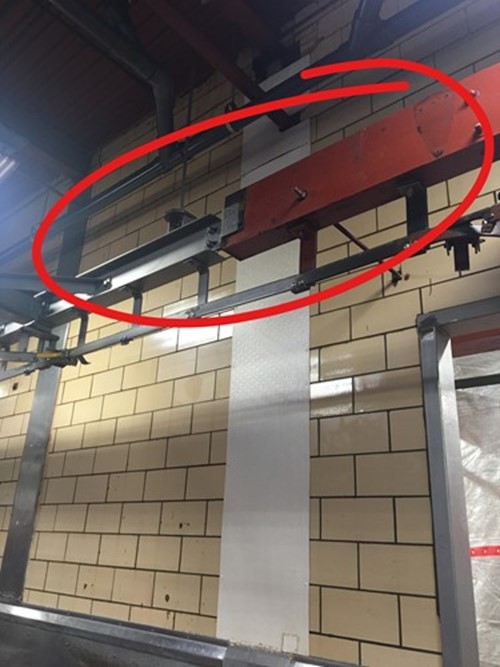 Installed overhead meat rail conveyor system