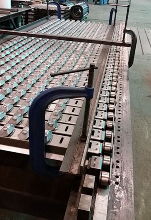 Custom molds on this oven conveyor chain