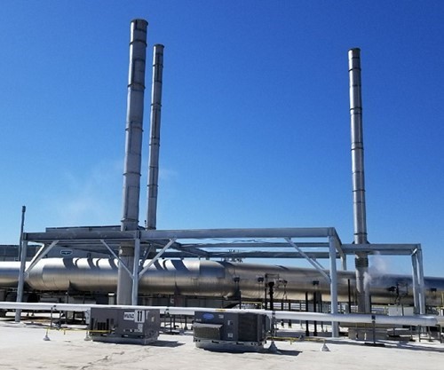 Stainless steel stack and stack support steel outside a plant