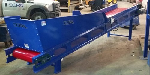Close up of a blue and red metal custom conveyor