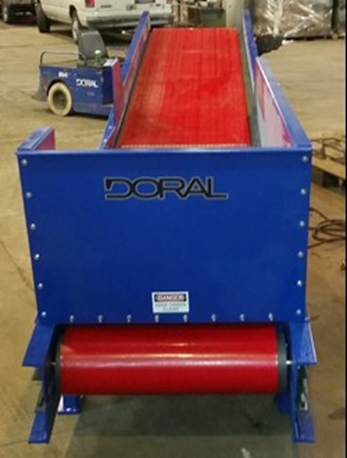 Close up of a blue and red metal custom conveyor
